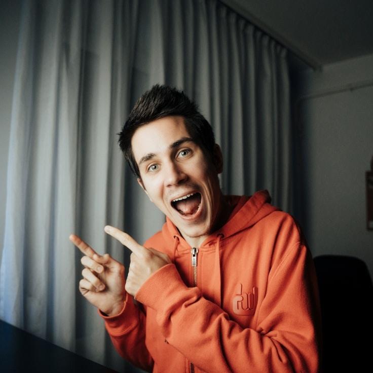 Aarav Singh, Lead Design Curator at Quill Haven Wander, reviewing corporate floral arrangements